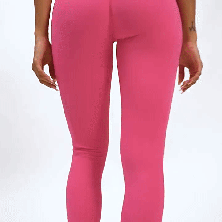 backside view of the pink forbidden leggings